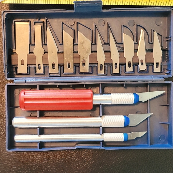 Carving Set. NWOT. 13 blades. Comes with case.